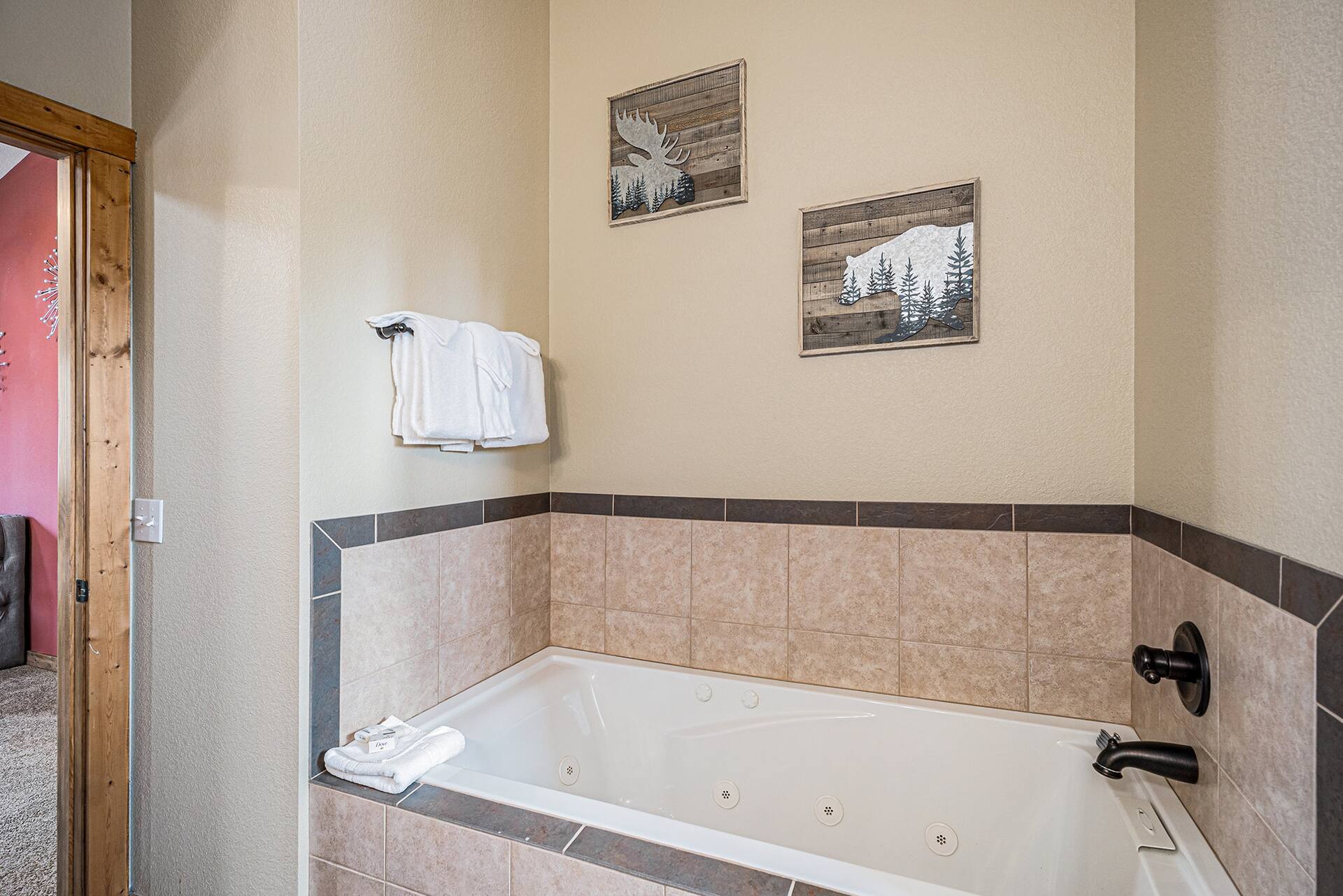 Upstairs bath with a jetted soaking tub