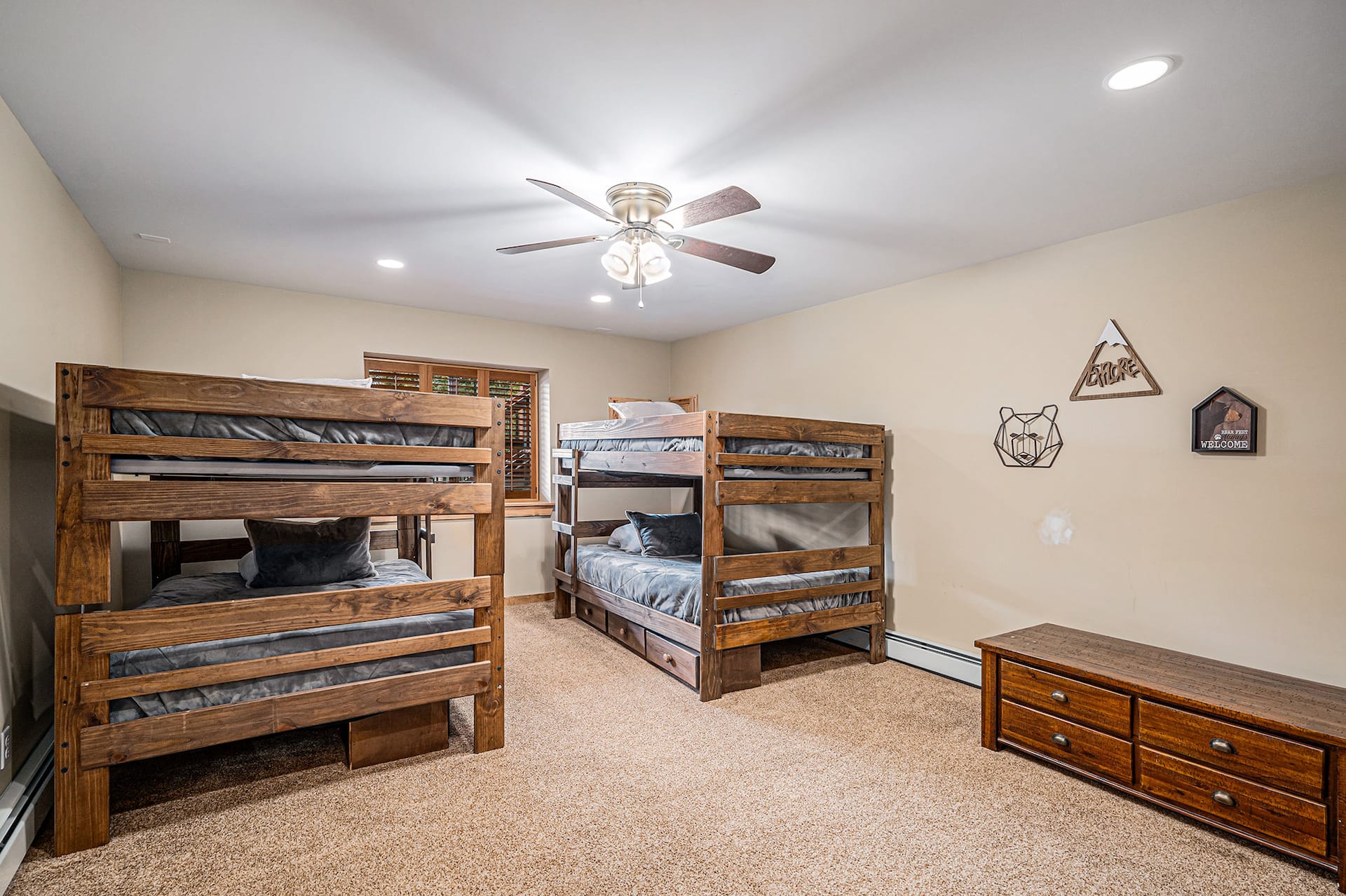 Lower-level bunk room with two bunk beds